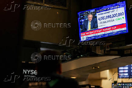 FILE PHOTO: A screen displays news on 