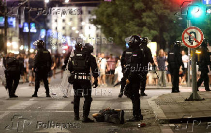 Serbia's police intervene to end standoff between ruling party supporters and anti-government protesters in Belgrade