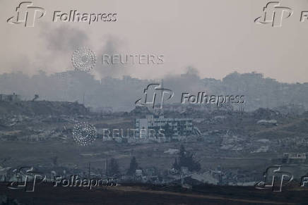 FILE PHOTO: Smoke rises from Gaza, as seen from Israel