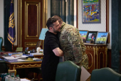 Ukraine's President Zelenskiy and Head of the Security Service of Ukraine Maliuk embrace each other during their meeting in Kyiv
