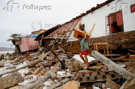 Erick weakens to tropical storm over Mexico, leaves trail of damage