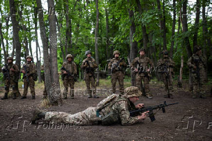 Foreign volunteers of the Ukrainian National Guard brigade attend military exercises at a training ground near a front line in Kharkiv region