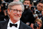 FILE PHOTO: Director Steven Spielberg poses on the red carpet as he arrives for the screening of the film 
