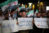 Protest in Aleppo following Israeli airstrikes on Syrian army near As Suwayda
