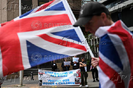Anti-immigration protest outside the Britannia International Hotel, in Canary Wharf