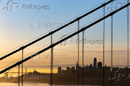 FILE PHOTO: The San Francisco skyline is pictured at sunrise