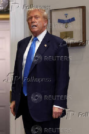 U.S. President Trump signs the VA Home Loan Program Reform Act at the White House in Washington, D.C.
