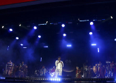 O cantor seu Jorge se apresenta no festival C6 Fest