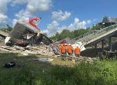 Aftermath of bridge collapse and train derailment in Russia's Bryansk region
