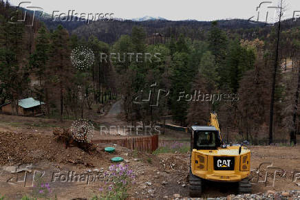 A year after the South Fork and Salt Fires ravaged a New Mexico Mountain village