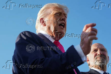 U.S. President Donald Trump speaks with the media at Joint Base Andrews