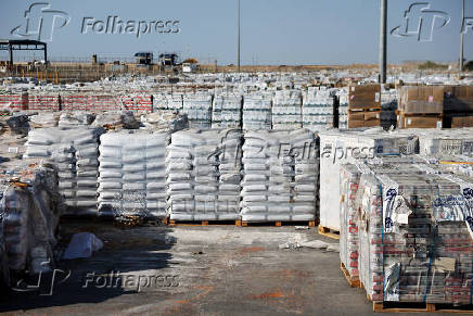 Humanitarian aid is waited to be transferred into Gaza from Israel, at the Gaza part of the Kerem Shalom crossing in the Gaza Strip