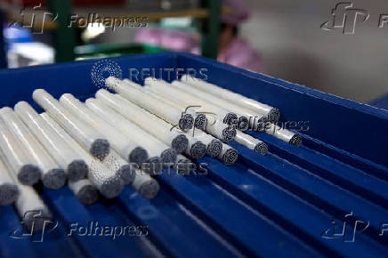 Electronic cigarettes are pictured at a production line in a factory in Shenzhen