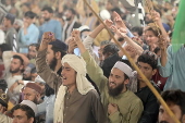 Supporters of Islamic organization Jamiat Ulema-e-Islam rally in Lahore in solidarity with Palestinians