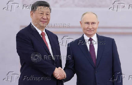 Russian President Putin and Chinese President Xi meet in Moscow