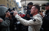 Political activist Tommy Robinson faces court over journalist harassment