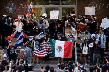 Rally in solidarity with Los Angeles protests against federal immigration sweeps, in Austin