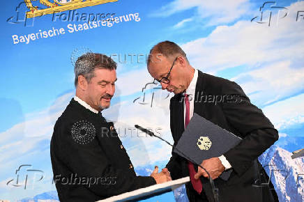 Chancellor Merz holds a press conference following a Bavarian cabinet meeting at Zugspitze mountain