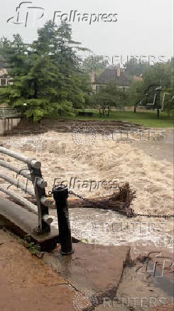 A view shows flooded creek, in Kansas City