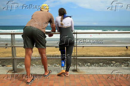 Coach Alex Sadaba and surfer Mireia Cabanes talk about the competition during the adaptive surfing Open LPA Surf City No Limit in Las Palmas de Gran Canaria