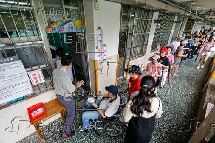Voters cast their ballots in recall election for several Taiwanese legislators