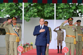 Pakistan's Prime Minister Shehbaz Sharif, along with Chief of the Army Staff (COAS) of Pakistan Asim Munir, reviews the parade at the passing out ceremony of 151st Long Course at the Pakistan Military Academy Kakul, Abbottabad
