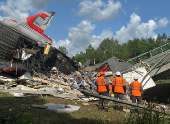 Aftermath of bridge collapse and train derailment in Russia's Bryansk region