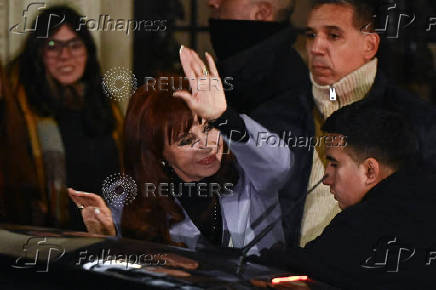 Argentina's former President Cristina Fernandez de Kirchner walks out of a building before participating in an event to commemorate the Peronist Resistance Day at the Partido Justicialista national building