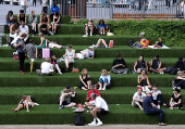 People enjoy the weather in London