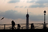 The Pont des Arts bridge and the Eiffel Tower in Paris