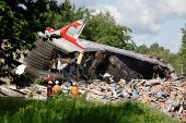 Aftermath of bridge collapse and train derailment in Russia's Bryansk region