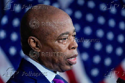 FILE PHOTO: New York City Mayor Eric Adams speaks during a news conference at City Hall in New York City
