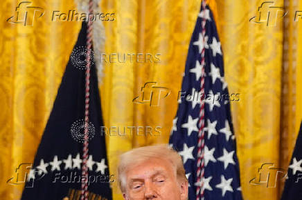 U.S. President Trump participates in a signing ceremony for the 