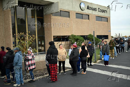 Food pantry is busy, weeks into the continuing U.S. government shutdown, in Commerce City