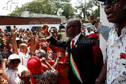 Partisans of PDCI (Democratic Party of Cote d'Ivoire) protest at their headquarters in Abidjan