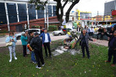 Tributes at place where Colombian Senator Uribe was shot during campaign event, in Bogota