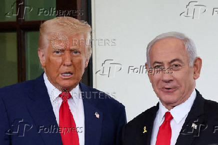 FILE PHOTO: FILE PHOTO: U.S. President Trump meets Israeli PM Netanyahu in Washington