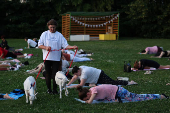 People practice yoga with baby goats in Moscow