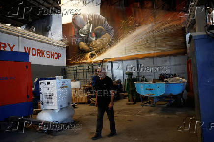 Greek shipyard workers pause work due to stifling heatwave, in Perama