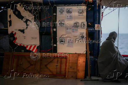 Rescued migrants aboard Sea-Watch 5 migrant search and rescue ship on their way to Italy