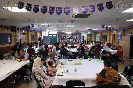 Khizra Mosque hosts a lunch as part of its Eid al-Adha celebrations, in Manchester