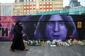 Fans pay tribute following the death of Ozzy Osbourne, in Birmingham