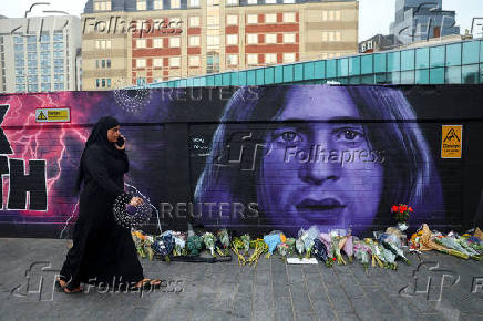 Fans pay tribute following the death of Ozzy Osbourne, in Birmingham