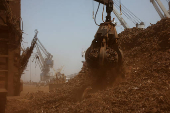 Scrap import from Korea is unloaded from a cargo ship at the Deendayal Port in Kandla