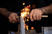 Blacksmiths sharpen blades for flagellation ahead of Ashura in Peshawar