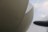 A view of the Marina Bay Sands Sky Park observatory deck next to the Art Science Museum in Singapore