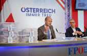 Head of Freedom Party Herbert Kickl and Michael Schilchegger attend a press conference in Vienna