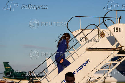 U.S. Homeland Security Secretary Kristi Noem, boards a plane at the Rzeszow-Jasionka Airport, in Rzeszow