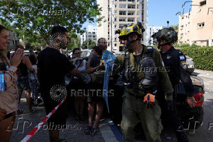 Aftermath of a missile strike from Iran on Israel, in Holon