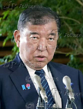 Japan's Prime Minister Shigeru Ishiba speaks to media after a meeting with cabinet ministers to discuss Japan's strategy in dealing with U.S. tariffs, in Tokyo